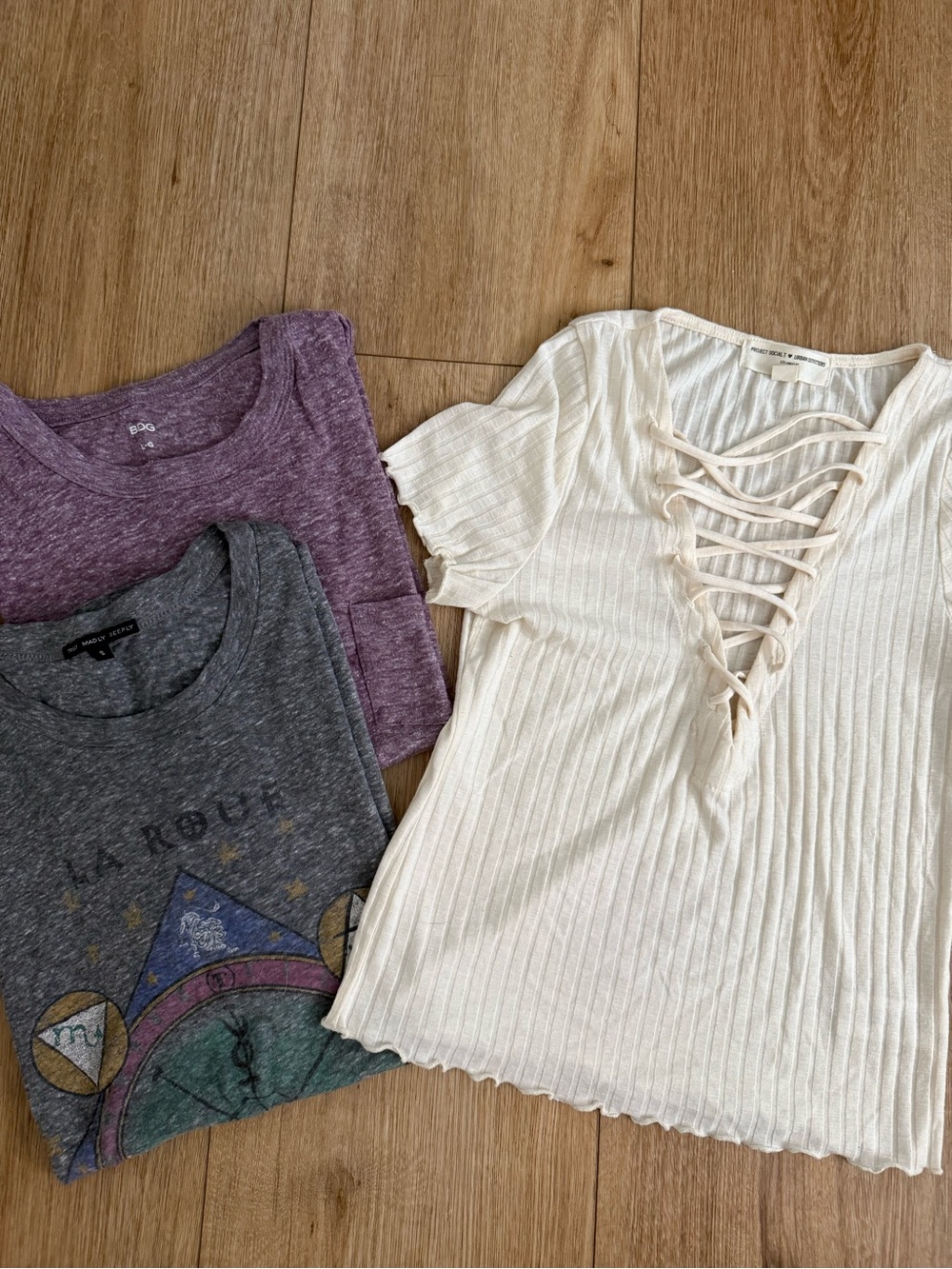 3 Urban Outfitters Tops: Cream Ribbed Lace-Up Short Sleeve Top + 2 tees